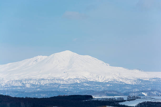 istock Clear winter sky and snowy mountains 2233100705