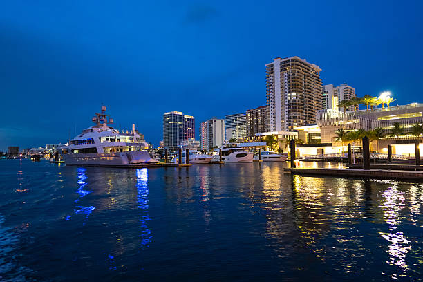 Fort Lauderdale marina skyline with yachts at night
