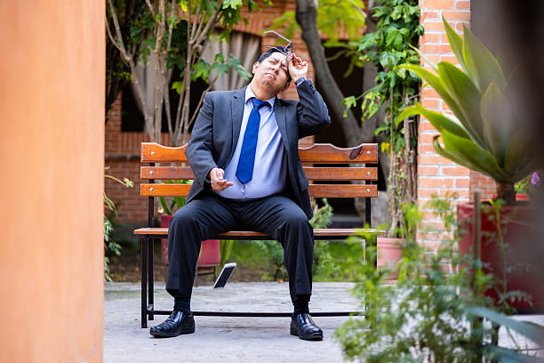 Series of a man using a cell phone and falling to the ground