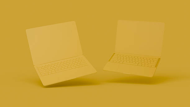 istock 3D render of two laptops floating against a monochrome yellow background 2233105770