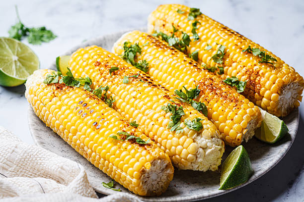 istock Grilled corn with cilantro, spices and butter. 2233107953