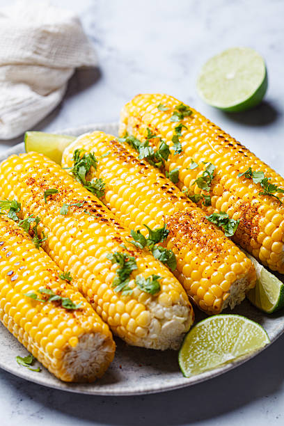 istock Grilled corn with cilantro, spices and butter. 2233107966