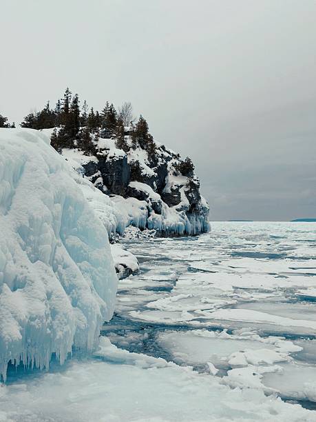 istock Frozen Indian Head Cove in Bruce Peninsula, with turquoise ice sheets and limestone cliffs 2233108205