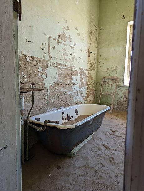 istock Abandoned Bathfub Filled with Sand in Kolmanskop, Namibia 2233109444
