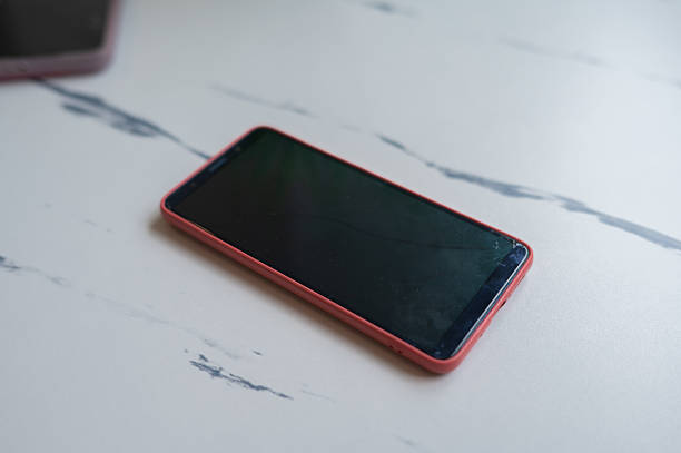 istock Broken screen smart phone on table stock photo 2233110972