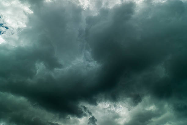 Dramatic dark storm sky background. Dark thunderstorm clouds rainny atmosphere. Meteorology danger windstorm rain clouds black disasters climate