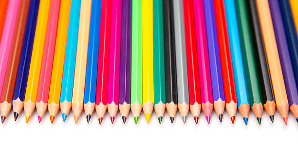 istock Colorful collection of sharpened pencils arranged neatly on white surface 2233117444