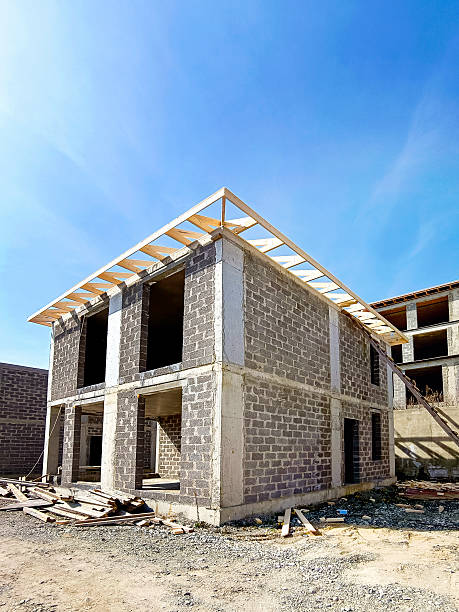 istock New house under construction. Construction site. Vertical photo. 2233118117