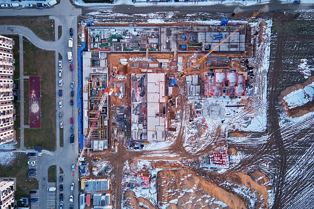 istock Construction site with cranes and new buildings 2233118925