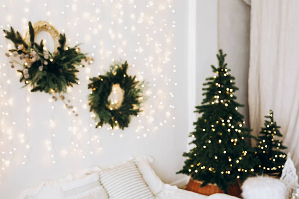 istock Decorative holiday living room with festive lights and greenery in a cozy setting 2233123632