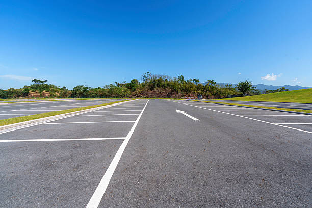 istock parking lot in city park 2233127524