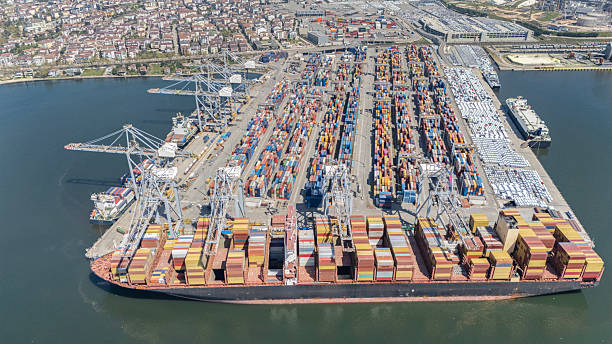 istock Massive cargo ship loaded with containers docked in the Port of Izmit. 2233129411