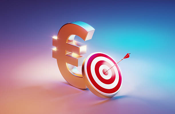 istock Silver Colored Euro Symbol And Red Target  Illuminated By Blue And Pink Lights On Pink Background 2233132554