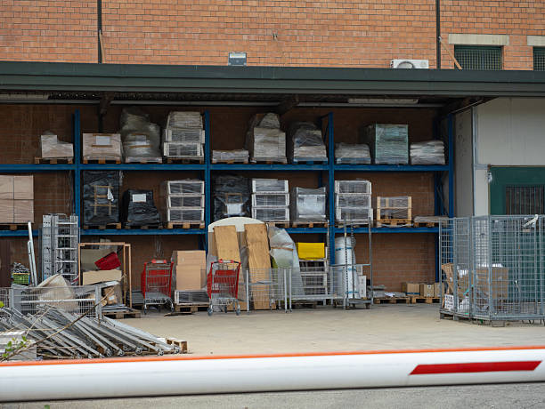 istock Outdoor Warehouse and Storage Area With Shelves And Various Items 2233132796