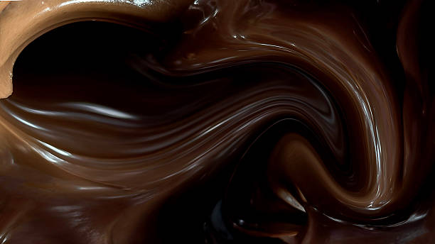 istock Rich glossy brown melted chocolate. Surface has smooth liquid amd swirl texture with overall impression is one of luxurious, decadent, and flowing material, perfect for conveying a sense of indulgence and flavor. 2233133558