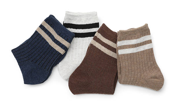 istock Pairs of folded soft socks isolated on white, top view 2233133734