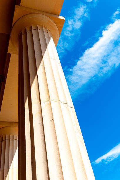 istock Impressive columns against a bright blue sky highlight architectural beauty in a historic location 2233137095