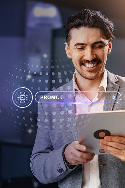 istock Man in suit smiling while using tablet in a modern office environment during daytime as he searches for information 2233137822