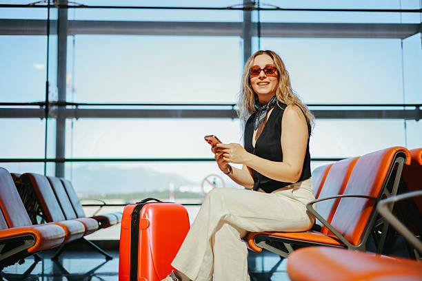 istock Young female passenger waiting for flight 2233139696