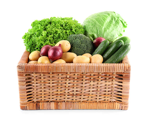 istock Different ripe vegetables in wicker box isolated on white 2233144688