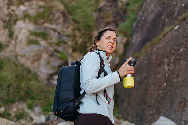 istock Female hiker walking throughout the forrest 2233148069