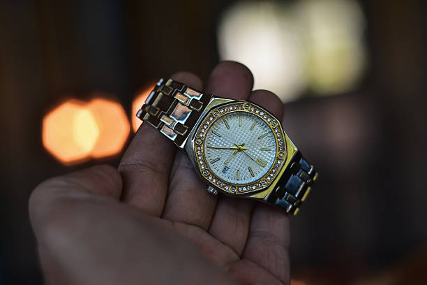 Swiss made vintage automatic watch on brown leather background