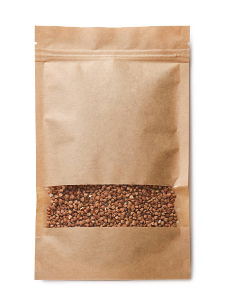 istock Paper pouch bag with buckwheat isolated on white, top view 2233149984