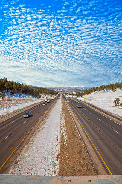 Hainan Mongolian and Tibetan Autonomous Prefecture, Qinghai Province-Grasslands and roads under the snow-capped mountains
