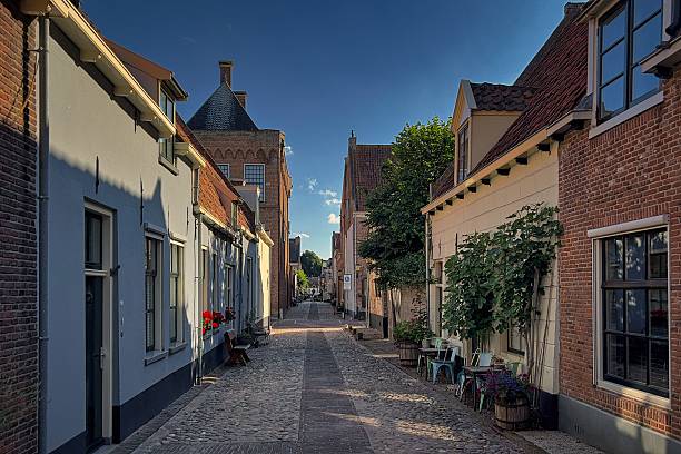 istock Charming historic European street with cobblestones. 2233151480