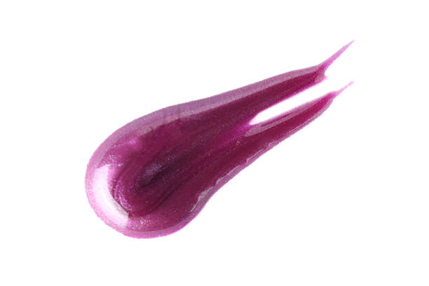 Sample of purple lipgloss isolated on white, top view