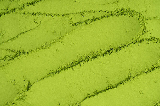 istock Matcha tea, matcha powder as a background. 2233158580