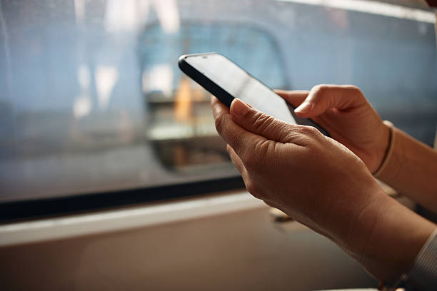 istock Close-up of human hands using smart phone 2233159523