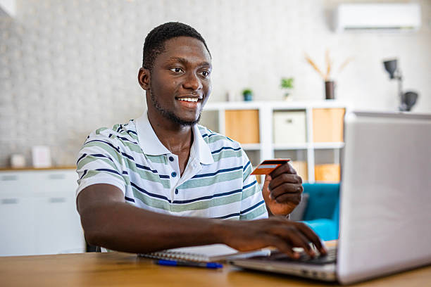 istock Man online shopping at home 2233162071