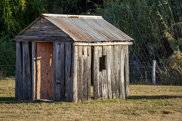 Historic timber cottage in the Hunter Valley, showcasing rustic architecture and charming rural surroundings. Scenic scene highlighting heritage buildings, pastoral landscape, and traditional Australian countryside
