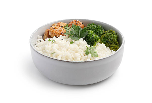 istock Tasty rice with broccoli, chicken and parsley isolated on white 2233163285