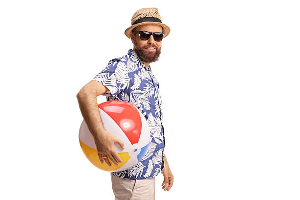 istock Bearded guy with sunglasses holding a beach ball 2233165065