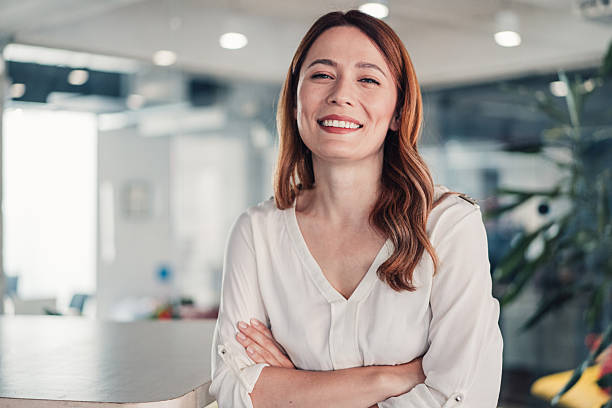 istock Confident businesswoman in modern office. 2233165270
