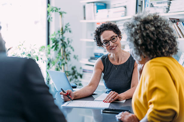 istock Business people signing a contract in the office. 2233165285