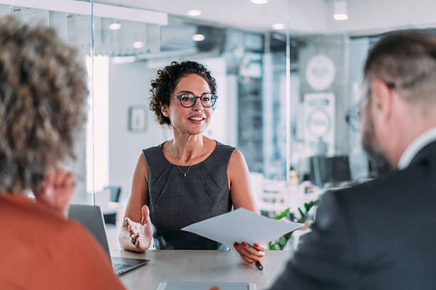 istock Group of business persons talking in the office. 2233165298