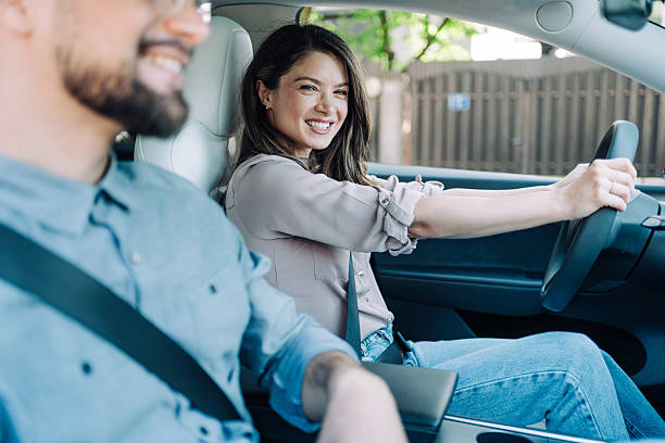 istock Young couple traveling by car. 2233165380