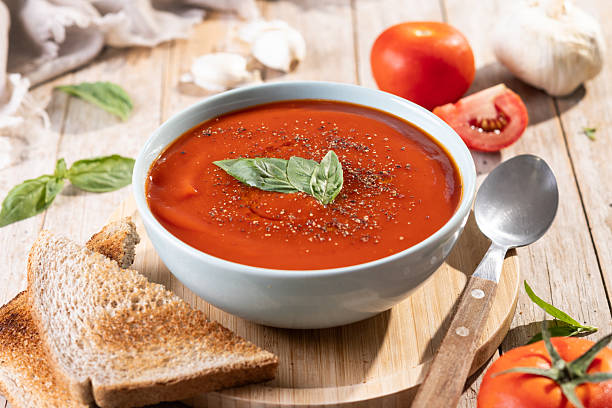 istock Homemade Tomato Soup in bowl with Basil 2233166659