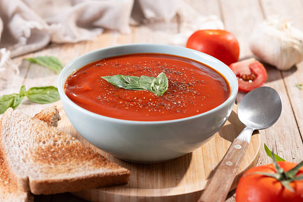 istock Homemade Tomato Soup in bowl with Basil 2233166736