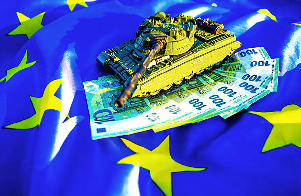istock Battle Tank on EC banknotes, flag European Union, background. 2233166780