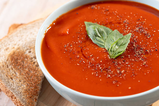 istock Homemade Tomato Soup in bowl with Basil 2233166854