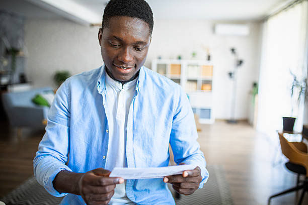 istock Man working on his financial bills at home 2233167433