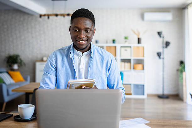 istock Morning routine – remote worker with laptop at home 2233167573