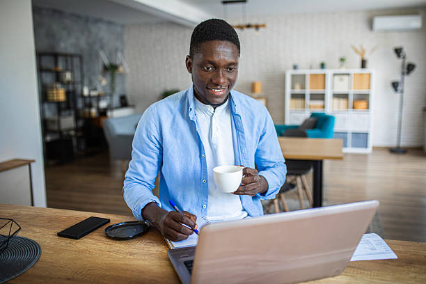 istock Morning routine – remote worker with laptop at home 2233167823