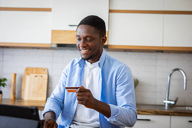istock Man online shopping at home 2233169131