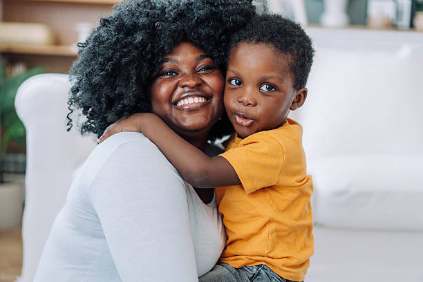 istock Mother and little son at home. 2233169251