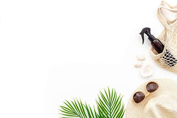 istock Beach accessories or summer outfit with palm leaves flat lay, top view 2233170706
